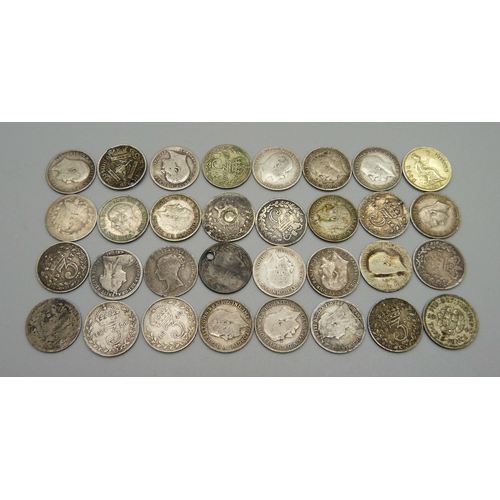 986 - A collection of mainly silver 3d coins including Victorian and a Victorian silver gilt four pence co... 