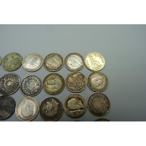 986 - A collection of mainly silver 3d coins including Victorian and a Victorian silver gilt four pence co... 