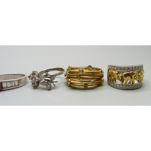 988 - Ten silver and silver gilt rings