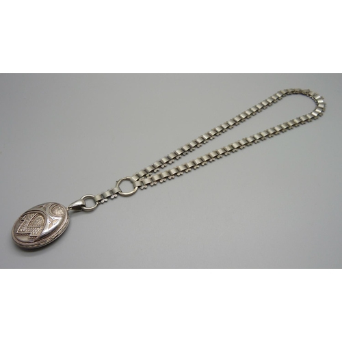 993 - A Victorian white metal locket and chain/collar, locket 33mm wide