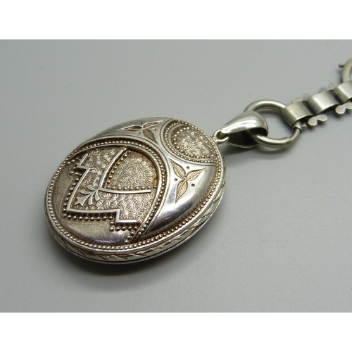 993 - A Victorian white metal locket and chain/collar, locket 33mm wide