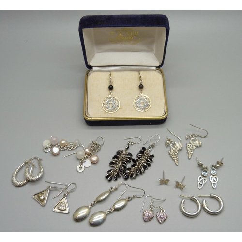 997 - Eleven pairs of silver earrings