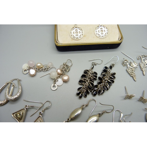 997 - Eleven pairs of silver earrings