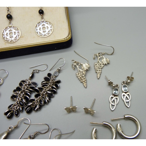 997 - Eleven pairs of silver earrings