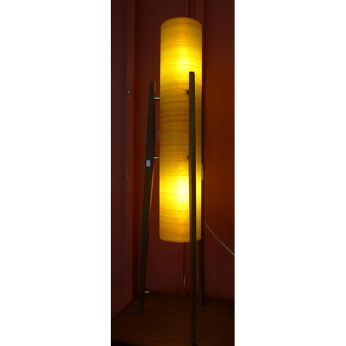 10 - A teak and orange fibreglass floor standing rocket lamp