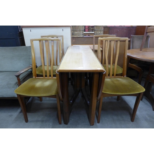 103 - A teak drop-leaf table and four chairs