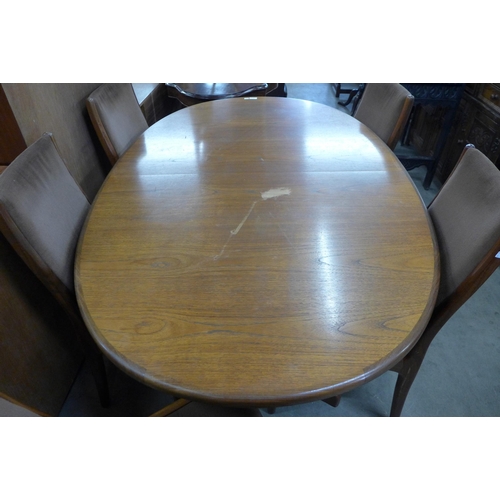 104 - A G-Plan Fresco teak extending dining table and five chairs