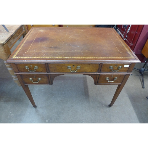 119 - A Victorian mahogany and brown leather topped library desk