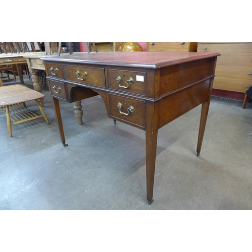 119 - A Victorian mahogany and brown leather topped library desk