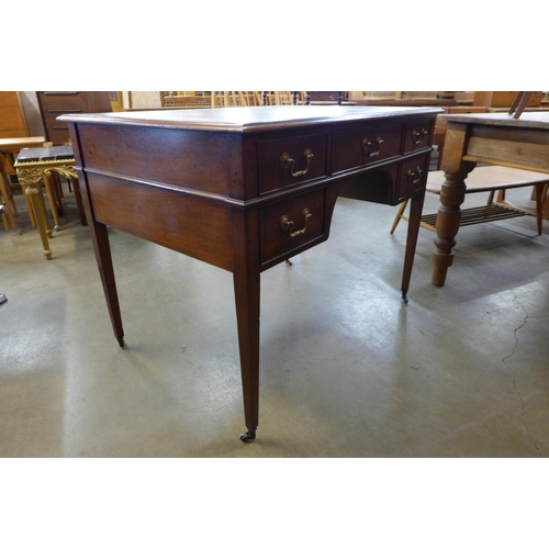 119 - A Victorian mahogany and brown leather topped library desk