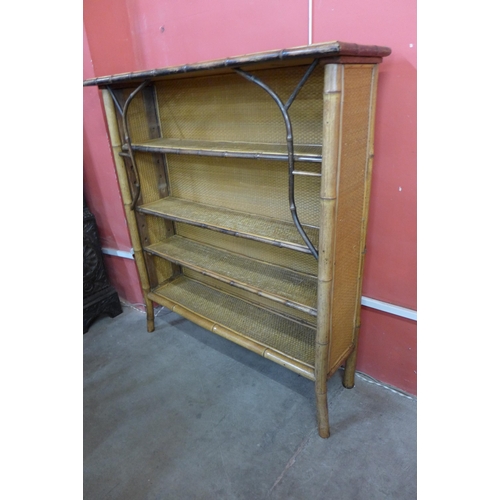 123 - A Victorian bamboo and rattan open bookcase