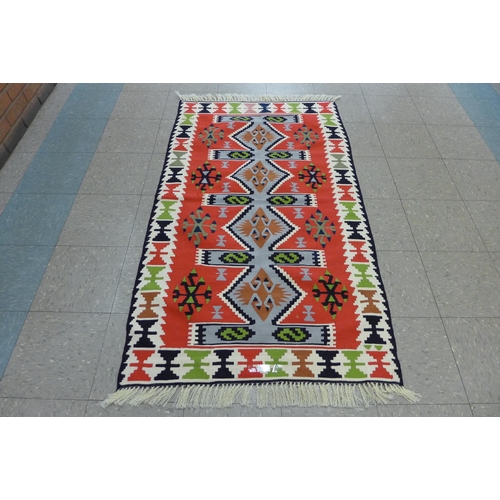 136 - A Turkish multicoloured rug