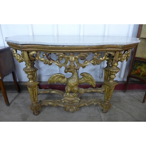 144 - An Italian carved giltwood and marble topped console table