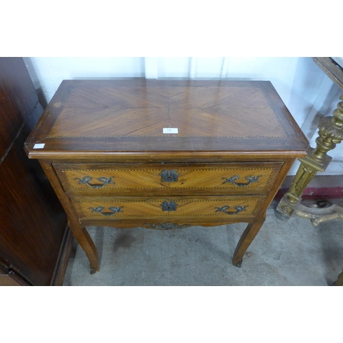145 - A French Louis XV style inlaid rosewood petit commode