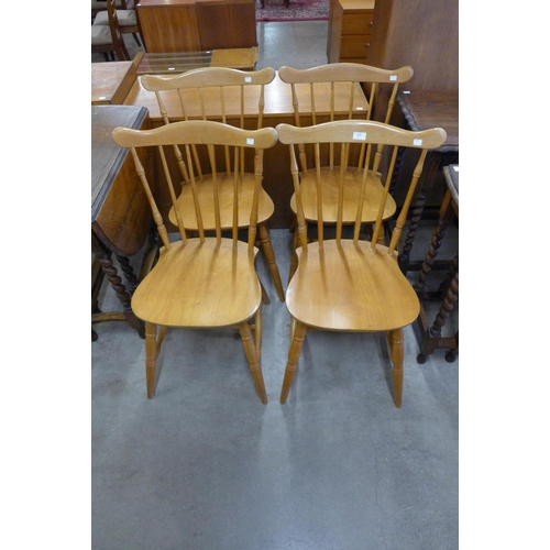 164 - A set of four beech kitchen chairs