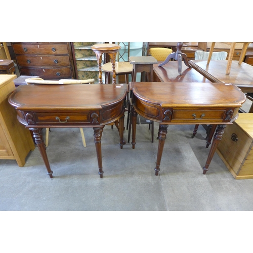 175 - A pair of French style hardwood single drawer console tables