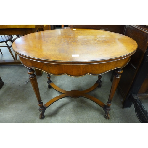 185 - A George I style walnut oval centre table