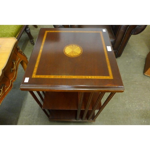 194 - A Regency style inlaid mahogany revolving bookcase