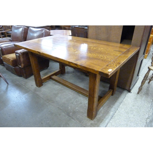 204 - An Arts and Crafts style oak refectory table