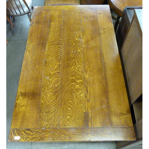 204 - An Arts and Crafts style oak refectory table