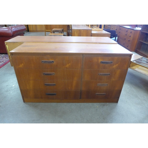 21 - A teak chest of drawers