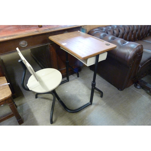 234 - An early 20th Century tubular steel and wooden school desk