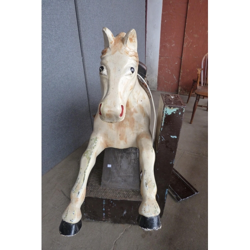 274 - A vintage child's mechanical horse ride