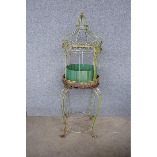 275D - A vintage wrought iron planter on stand