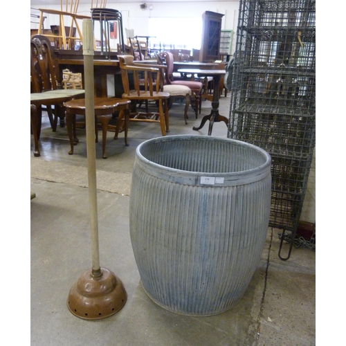 278 - A galvanised dolly tub and a copper ponch