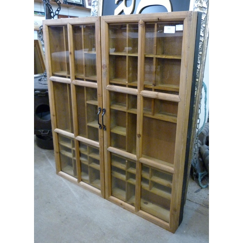 282 - A beech wall mounted two door display case