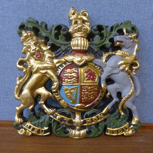 337 - A painted Royal armorial wall hanging plaque