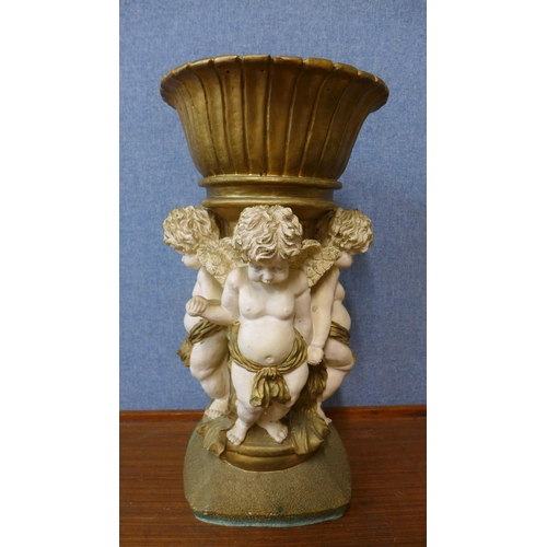 338 - An Italian style painted cherub planter