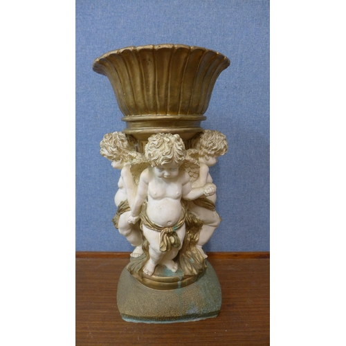 338 - An Italian style painted cherub planter