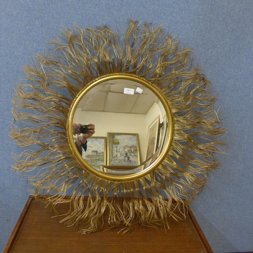 350 - A contemporary circular gilt framed mirror