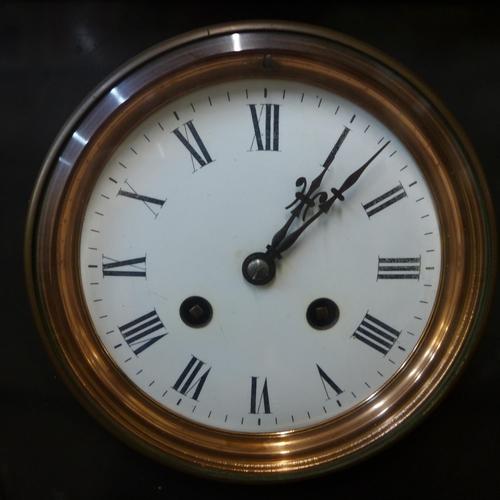 359 - A 19th Century French Belge noir mantel clock