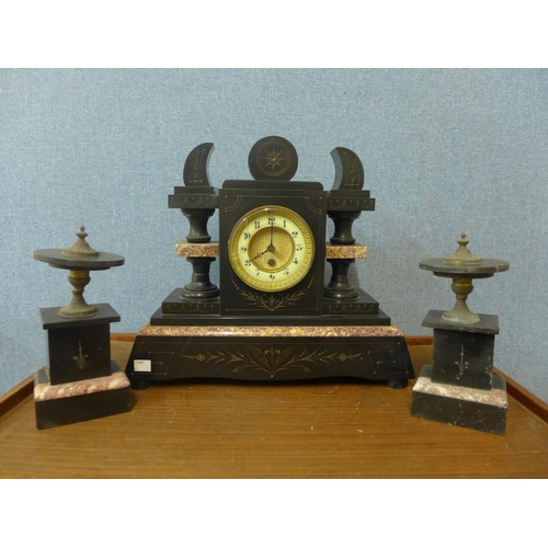 360 - A 19th Century French Belge noir mantel clock