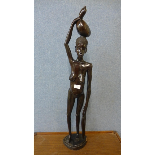 370 - An African carved hardwood figure of a nude lady