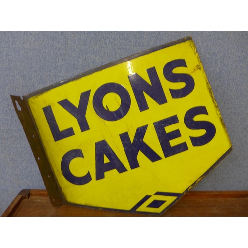 372 - A vintage double sided Lyons Cakes enamelled sign