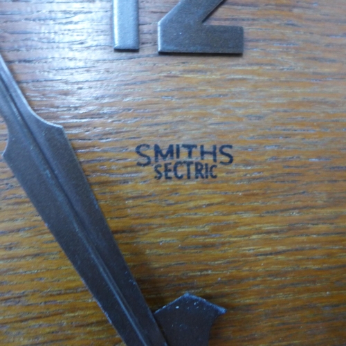 376 - An Art Deco Smiths Sectric oak wall clock, a mantel clock and a Smiths 8-day mantel timepiece