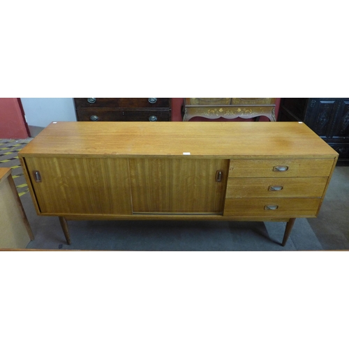 55 - A teak sideboard