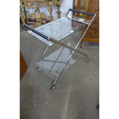 65 - A chrome and glass topped two handled cocktail trolley
