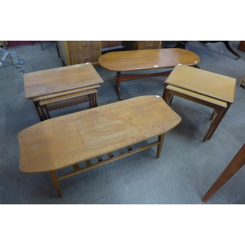 66 - Two teak coffee tables, a nest of tables and a nest of two tables