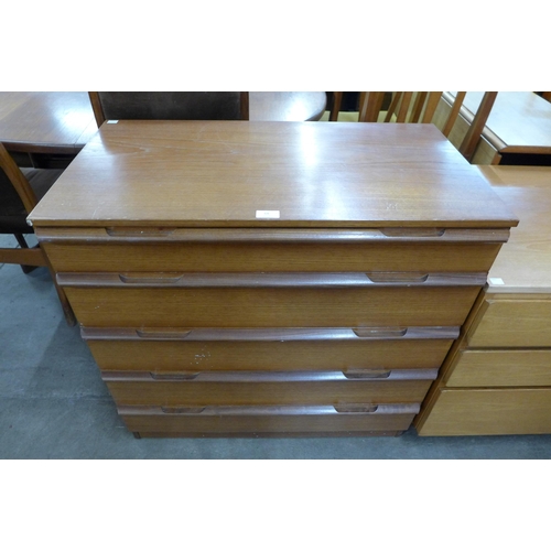 68 - A teak chest of drawers