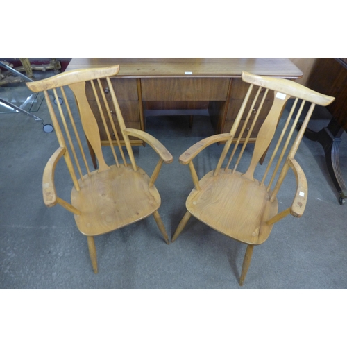 71 - A pair of Ercol style Blonde elm and beech chairs
