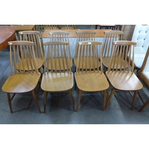 75 - A set of eight Scandinavian beech kitchen chairs