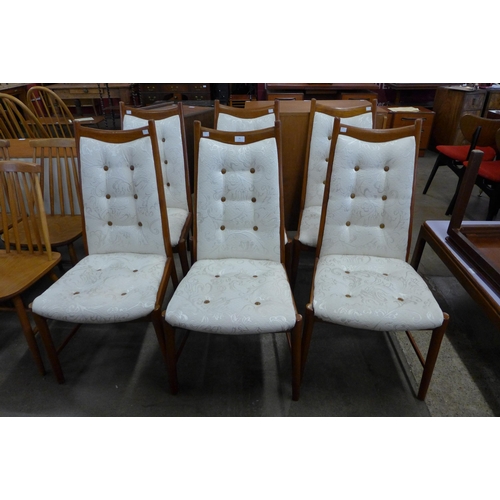 76 - A set of six Danish teak dining chairs