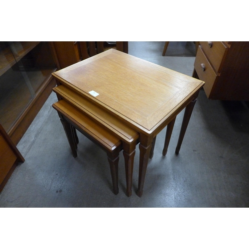 93 - A teak nest of tables