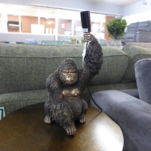 1343 - A gorilla holding a bulb table lamp, H 30cms (3148923)   #