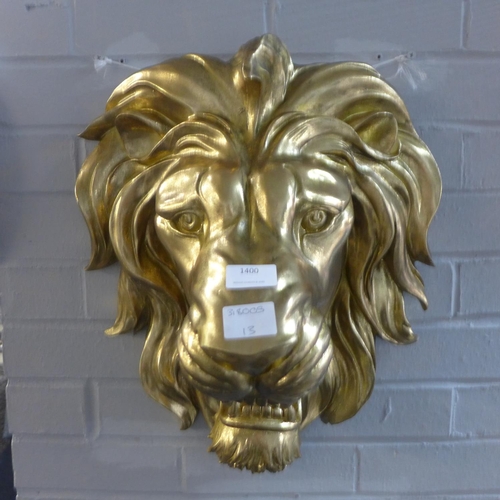 1400 - A gold bust of a lion
