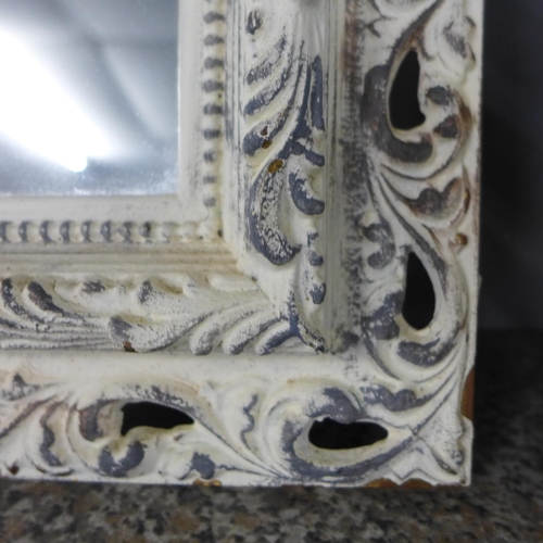 1431 - An antique white rustic wall mirror
